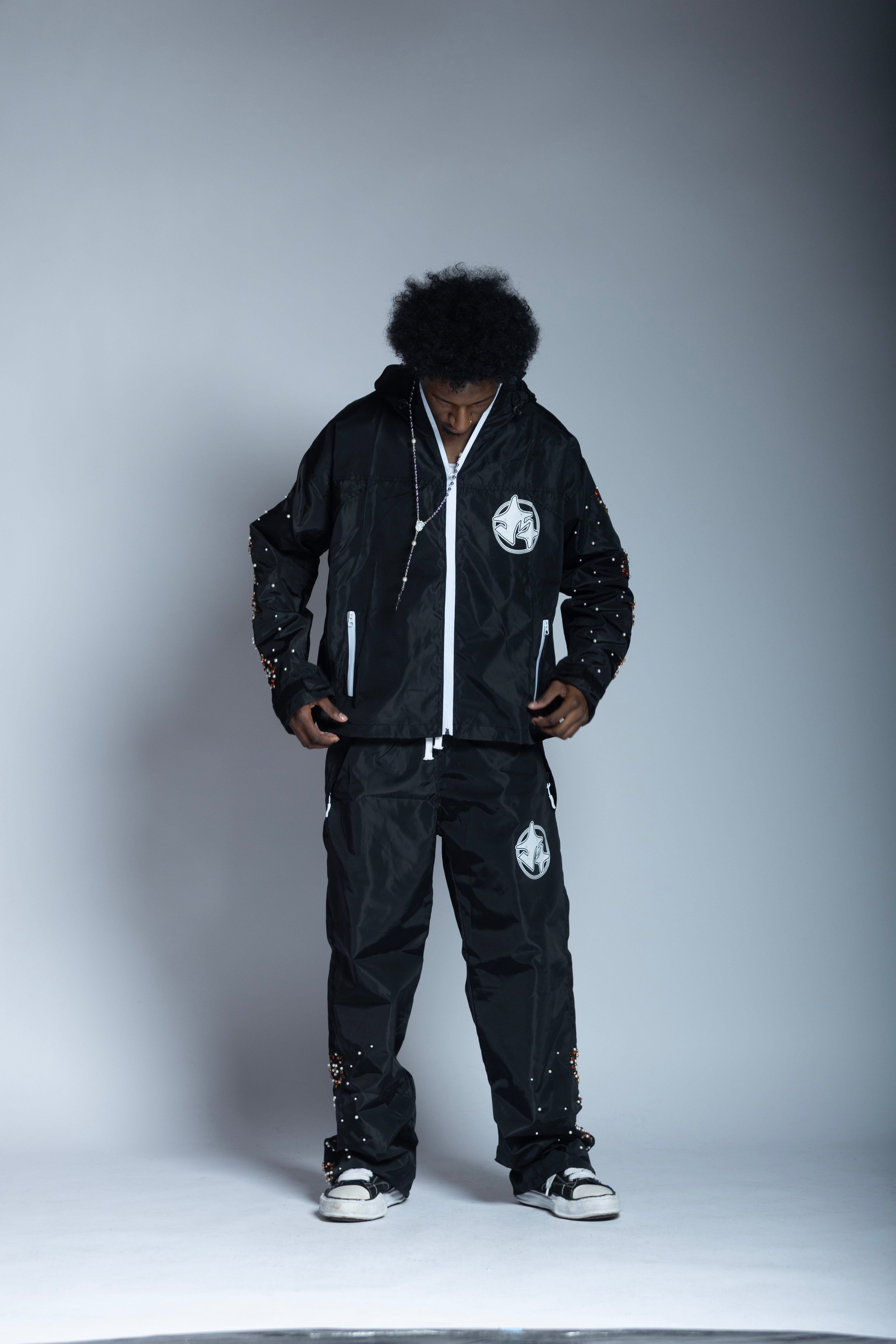 ‘triumph’ black rain pants