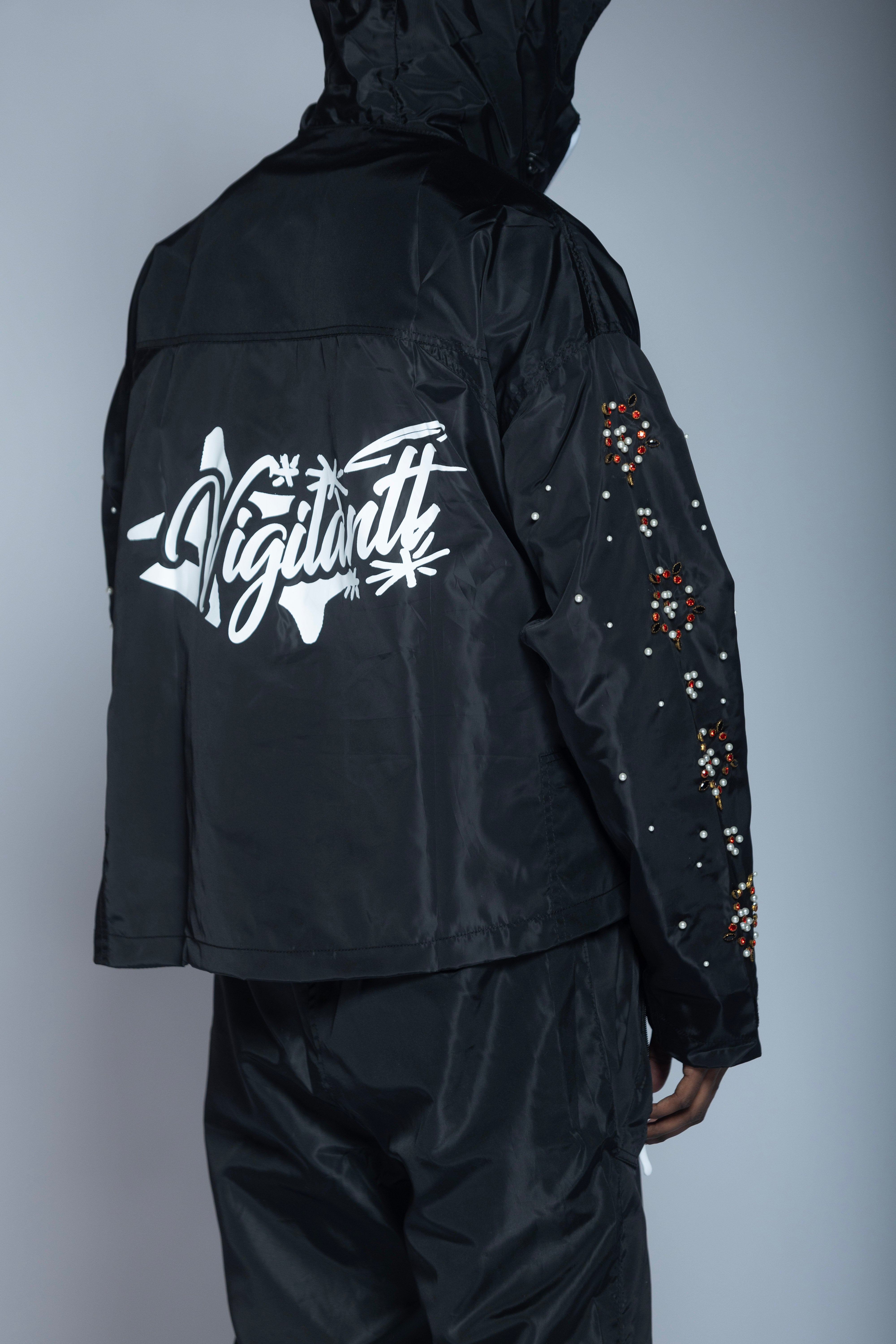 ‘triumph’ black rain jacket